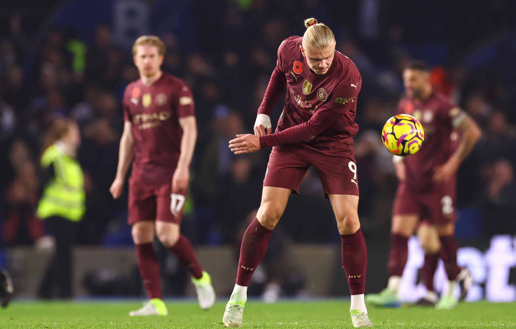 LOST CONTROL: Pep Guardiola "teaches" Van Hecke after Erling Haaland wrestles with Brighton players in Man City's loss